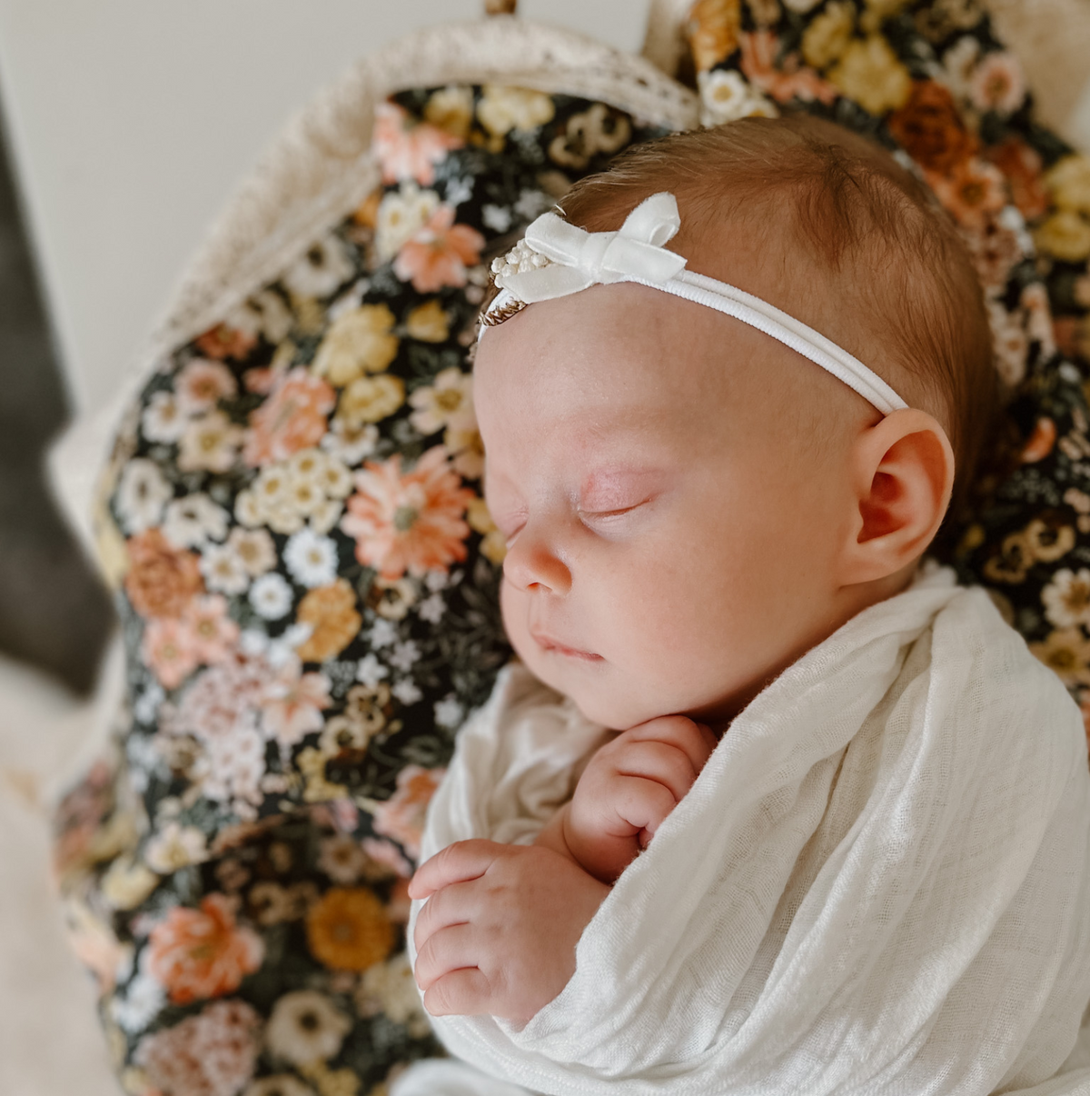 Diy newborn photos using a heirloom baby blanket 