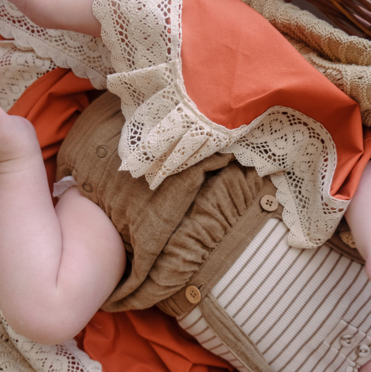 Terracotta or rust coloured baby blanket made in australia